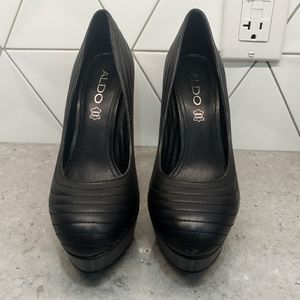 Black genuine leather heels